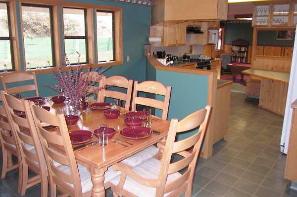 Hard maple flooring throughout kitchen and dining room.