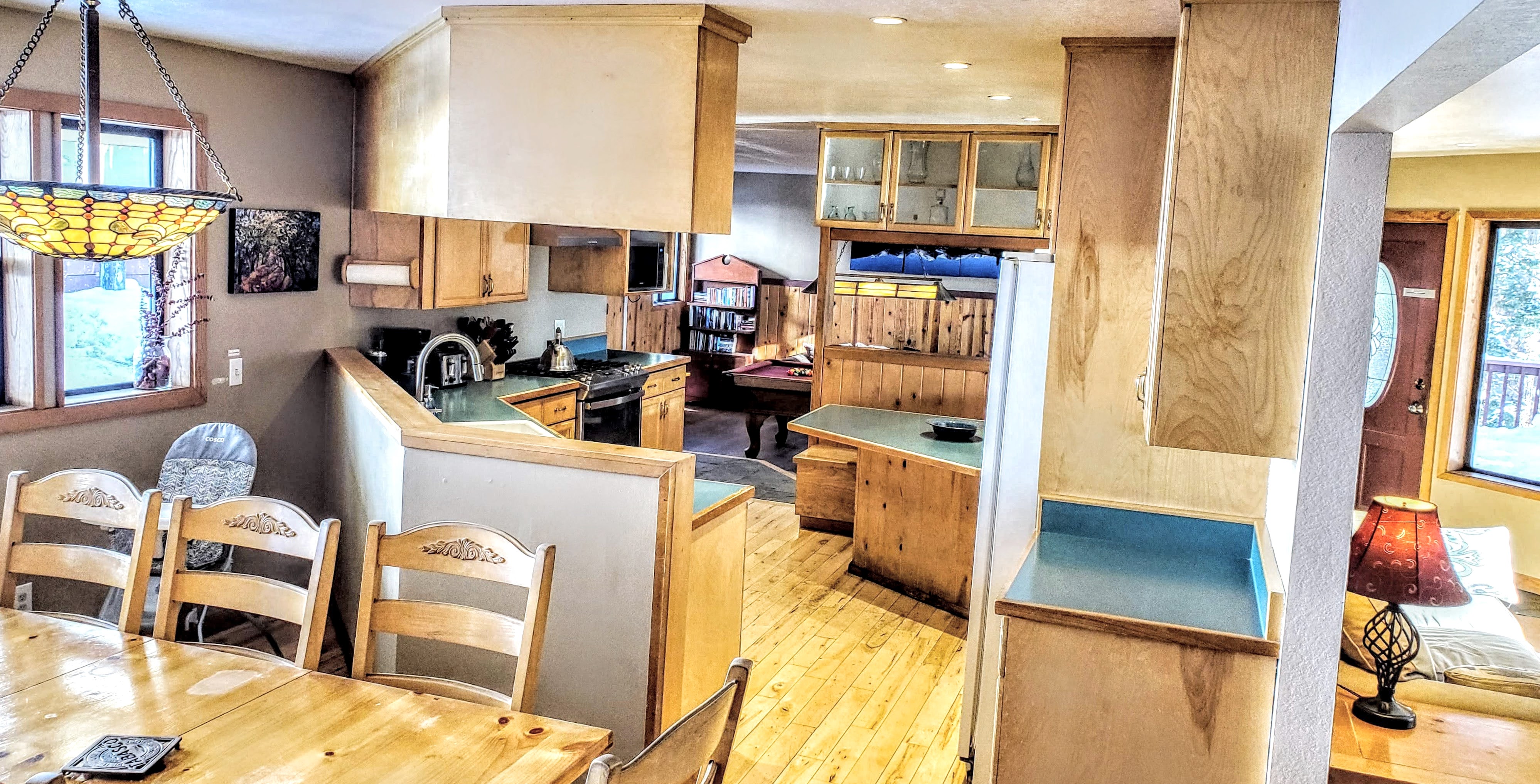 Hard maple flooring throughout kitchen and dining room.