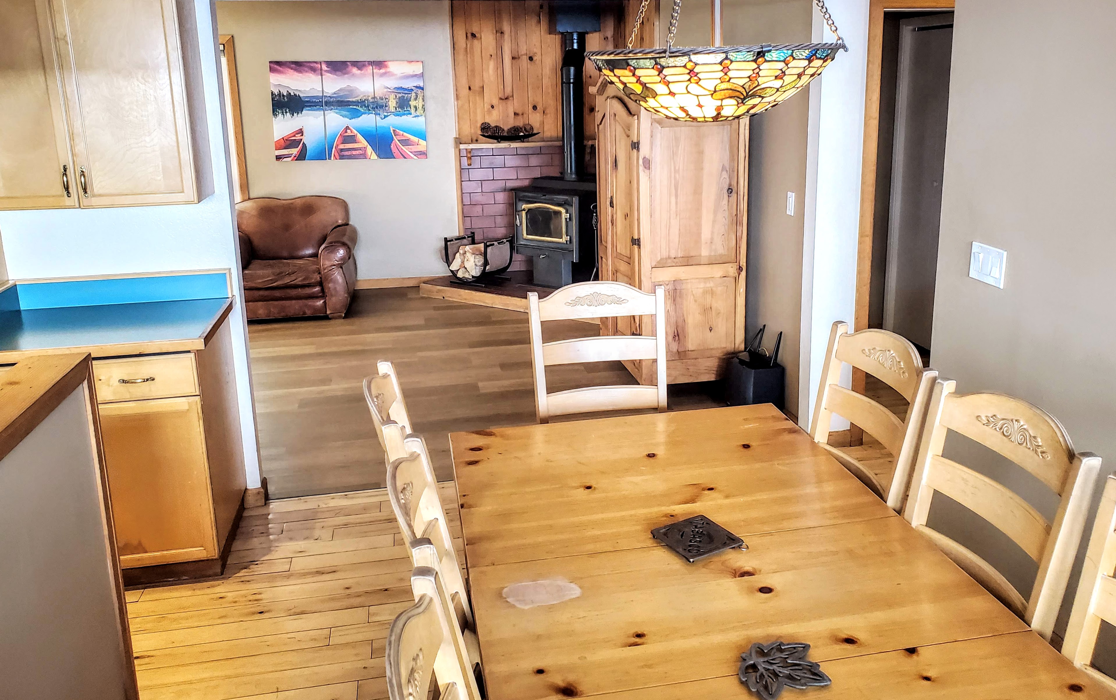 Entertain your guests at this Lake Tahoe vacation rental with 1000 feet of redwood deck, 8 person hot tub, custom built oak pool table, wood stove, views of Heavenly Ski Area and several mountain ranges and surrounded by fir trees.