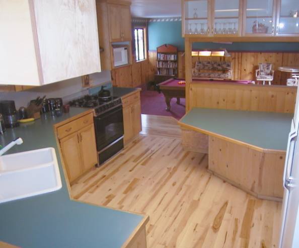Entertain your guests at this Lake Tahoe vacation rental with 1000 feet of redwood deck, 8 person hot tub, custom built oak pool table, wood stove, views of Heavenly Ski Area and several mountain ranges and surrounded by fir trees.