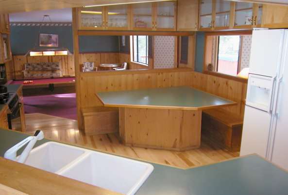 Entertain your guests at this Lake Tahoe vacation rental with 1000 feet of redwood deck, 8 person hot tub, custom built oak pool table, wood stove, views of Heavenly Ski Area and several mountain ranges and surrounded by fir trees.