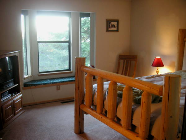 Entertain your guests at this Lake Tahoe vacation rental with 1000 feet of redwood deck, 8 person hot tub, custom built oak pool table, wood stove, views of Heavenly Ski Area and several mountain ranges and surrounded by fir trees.